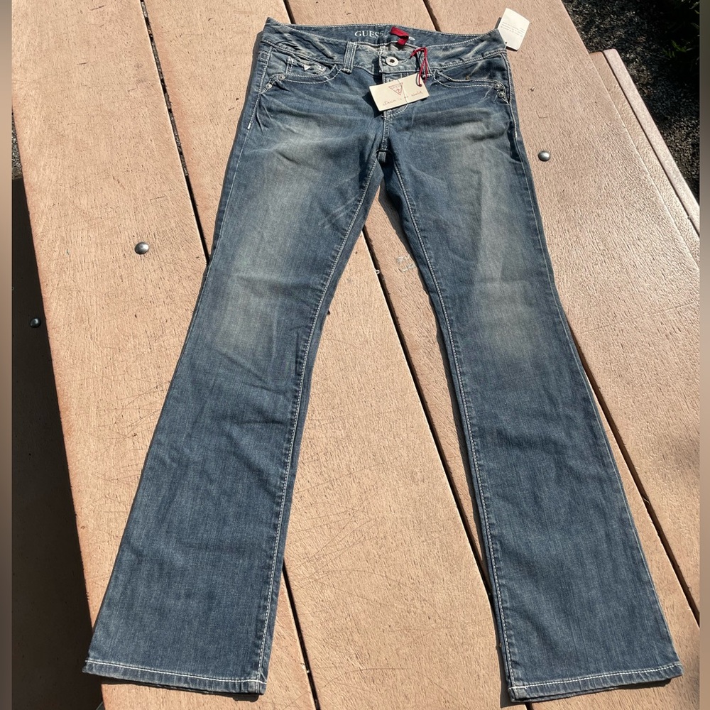 Vintage Guess jeans, medium wash, straight leg. Low rise. Never worn w tags